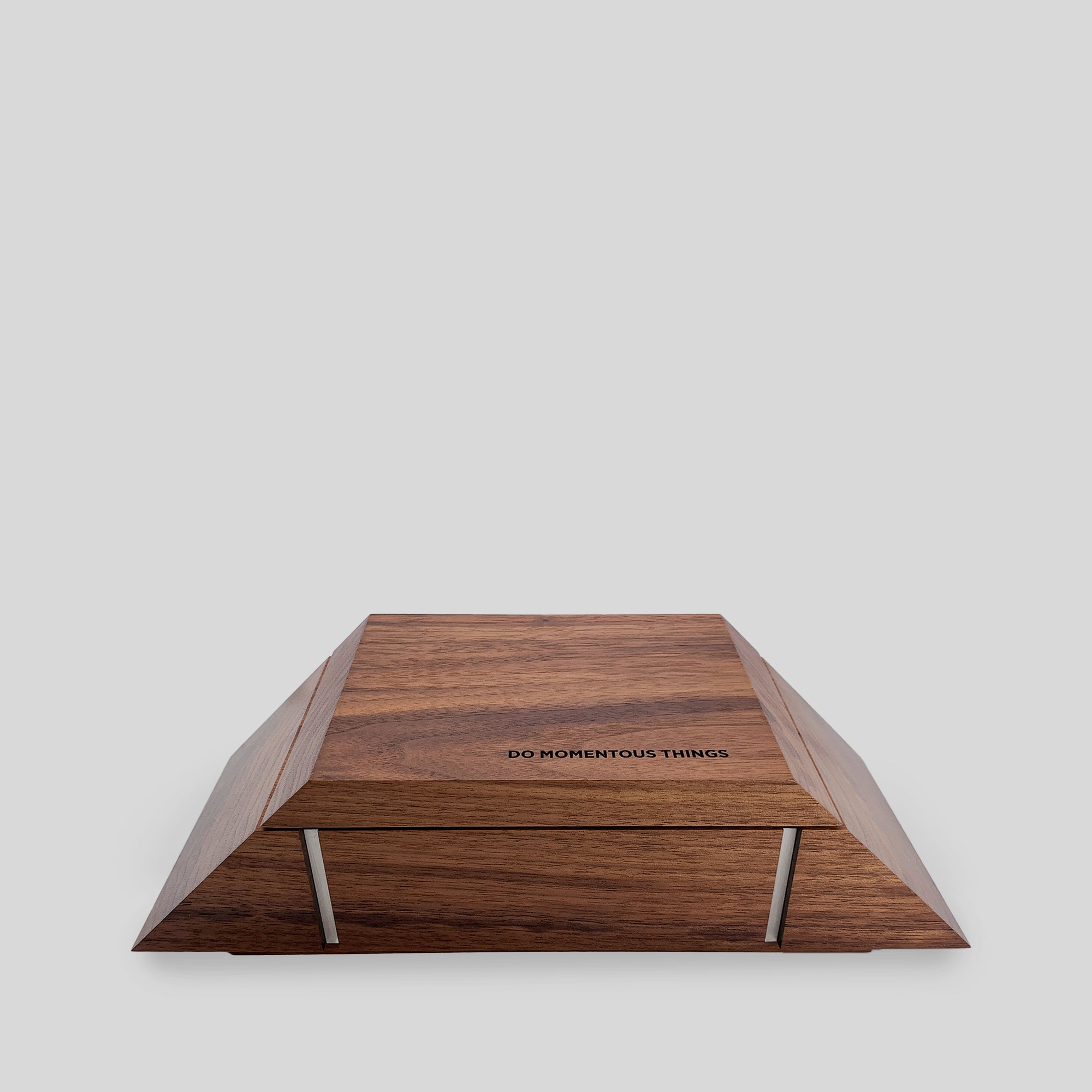 Stationery Box Meta: A triangular wooden box with a lid, crafted from walnut with aluminum accents and a removable pen tray for holding stationery.