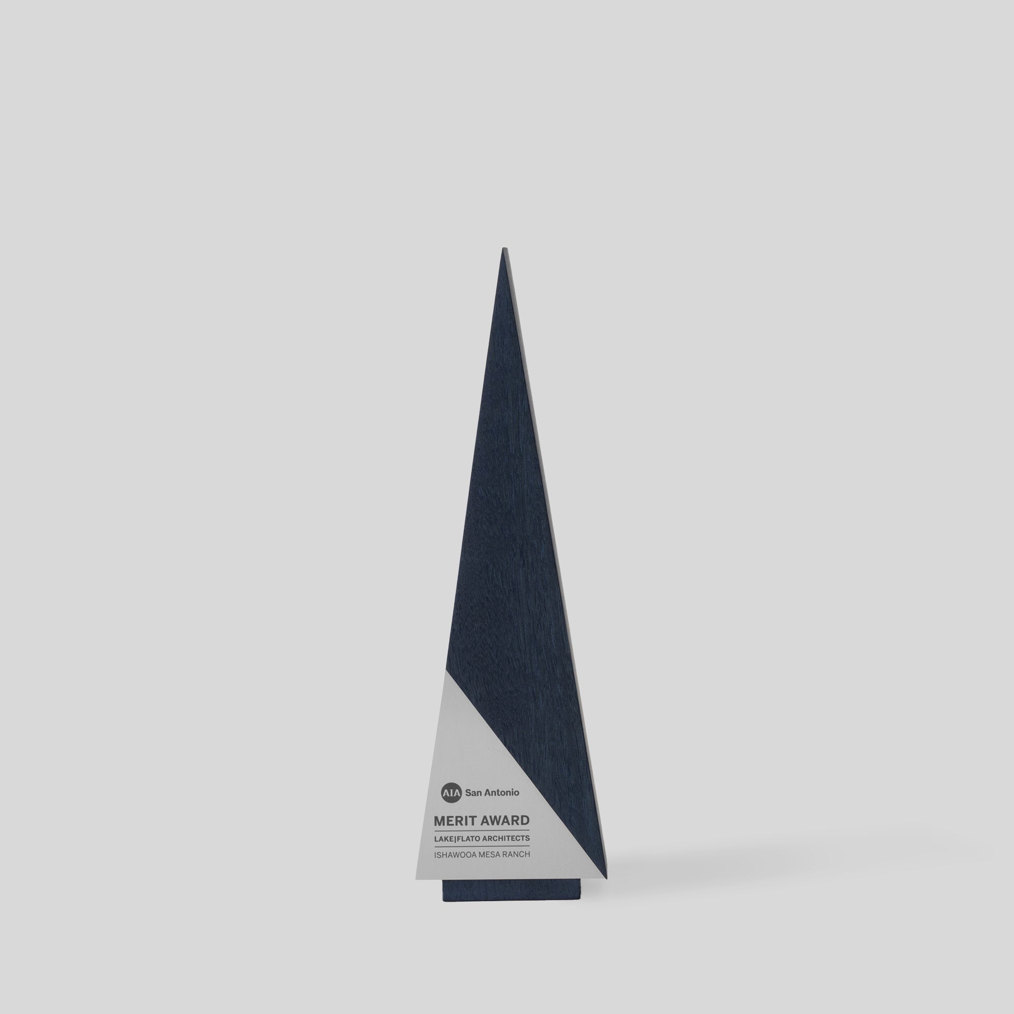 Gracilia A-Line Award | Medium, a triangular wood trophy with metal accent, embodies luxury with customizable faces and nameplates, ideal for personalized corporate recognition and celebration. Architect-designed and artisan-crafted in USA.