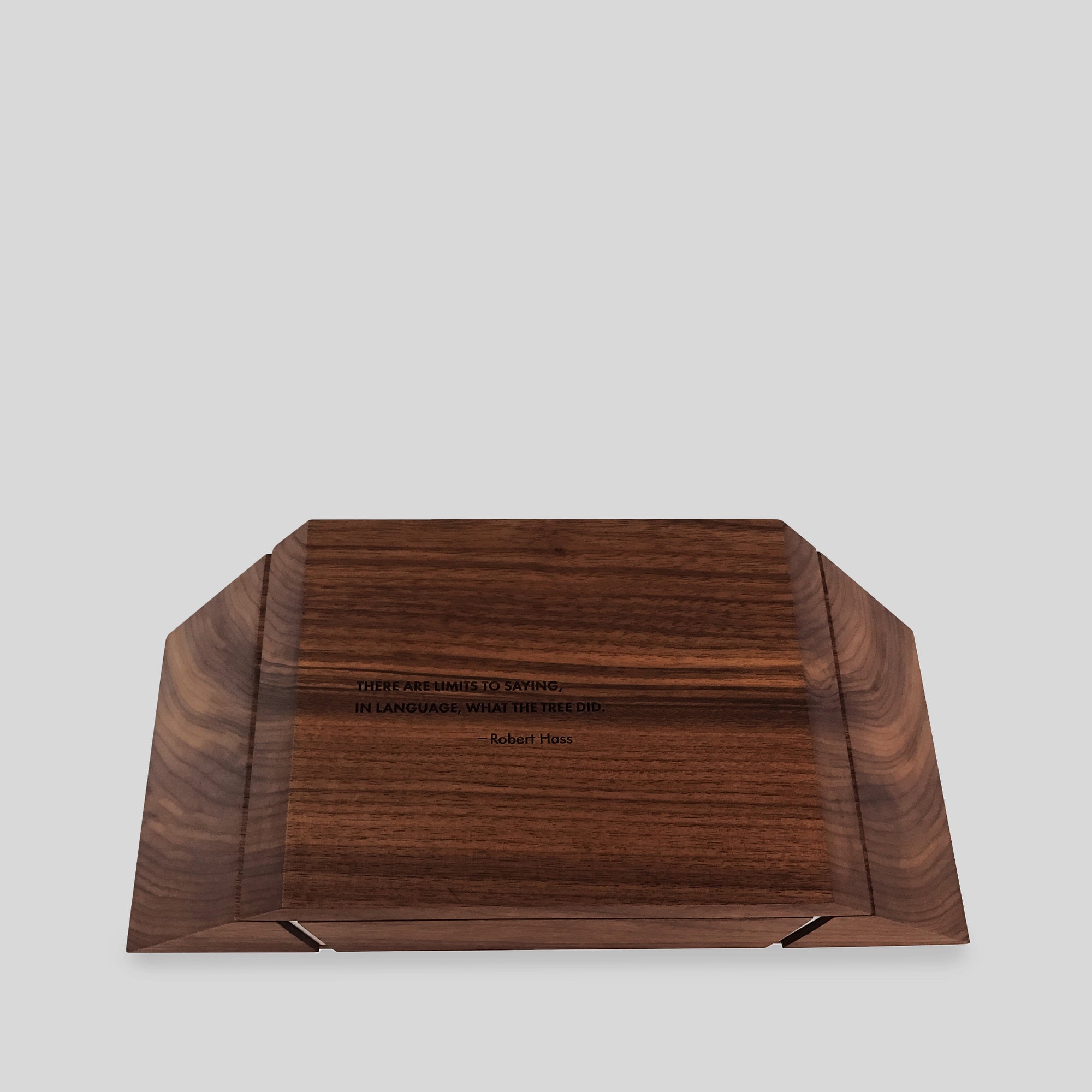 Stationery Box Meta showcasing a triangular design, crafted from walnut, featuring aluminum accents, customizable engravings, and a removable pen tray for A2/A10 stationery.