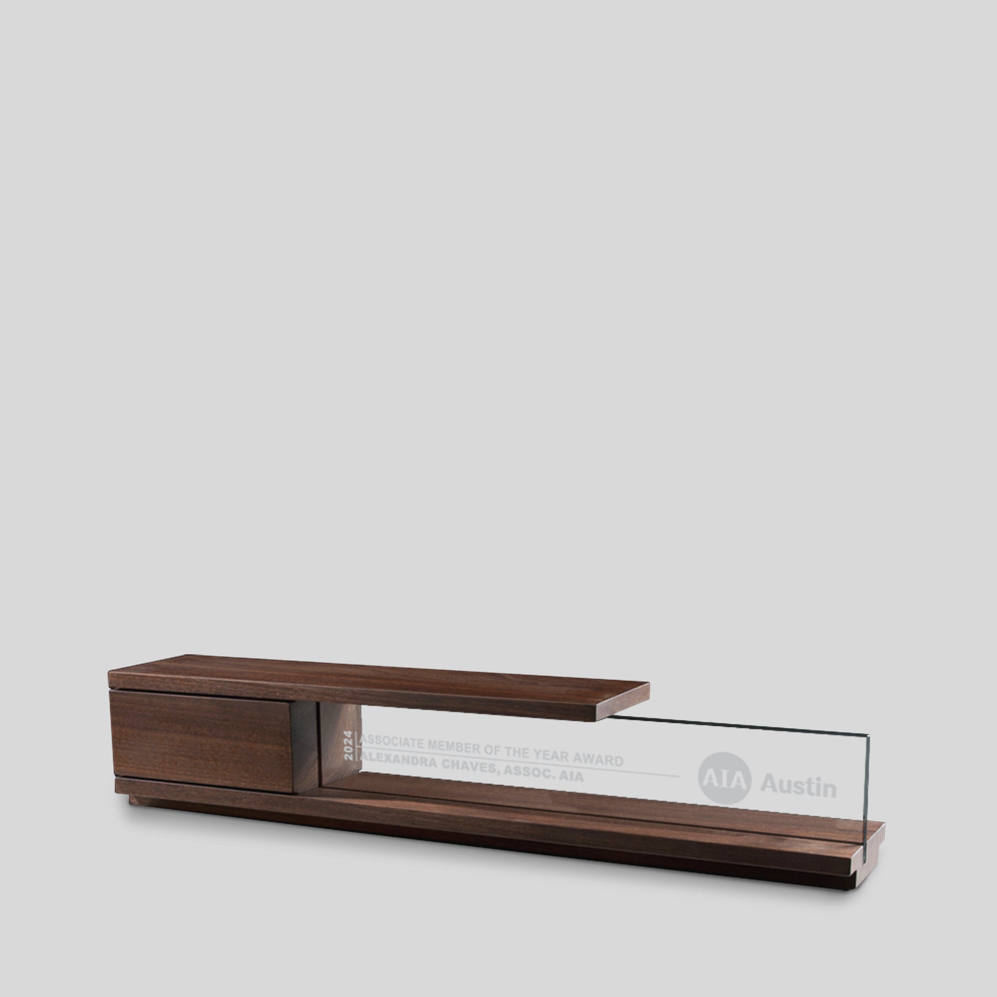 Portico Award: A high-end wooden trophy design with a cantilevered top and clear glass nameplate, personalized as design award, executive award, architect-designed and artisan-crafted in the USA. 